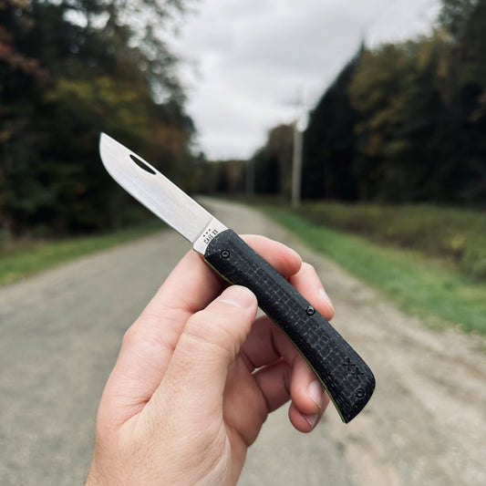 Case Knives Crossroads™ Black Burlap Laminate XR Sod Buster® Jr with Dayglow G-10